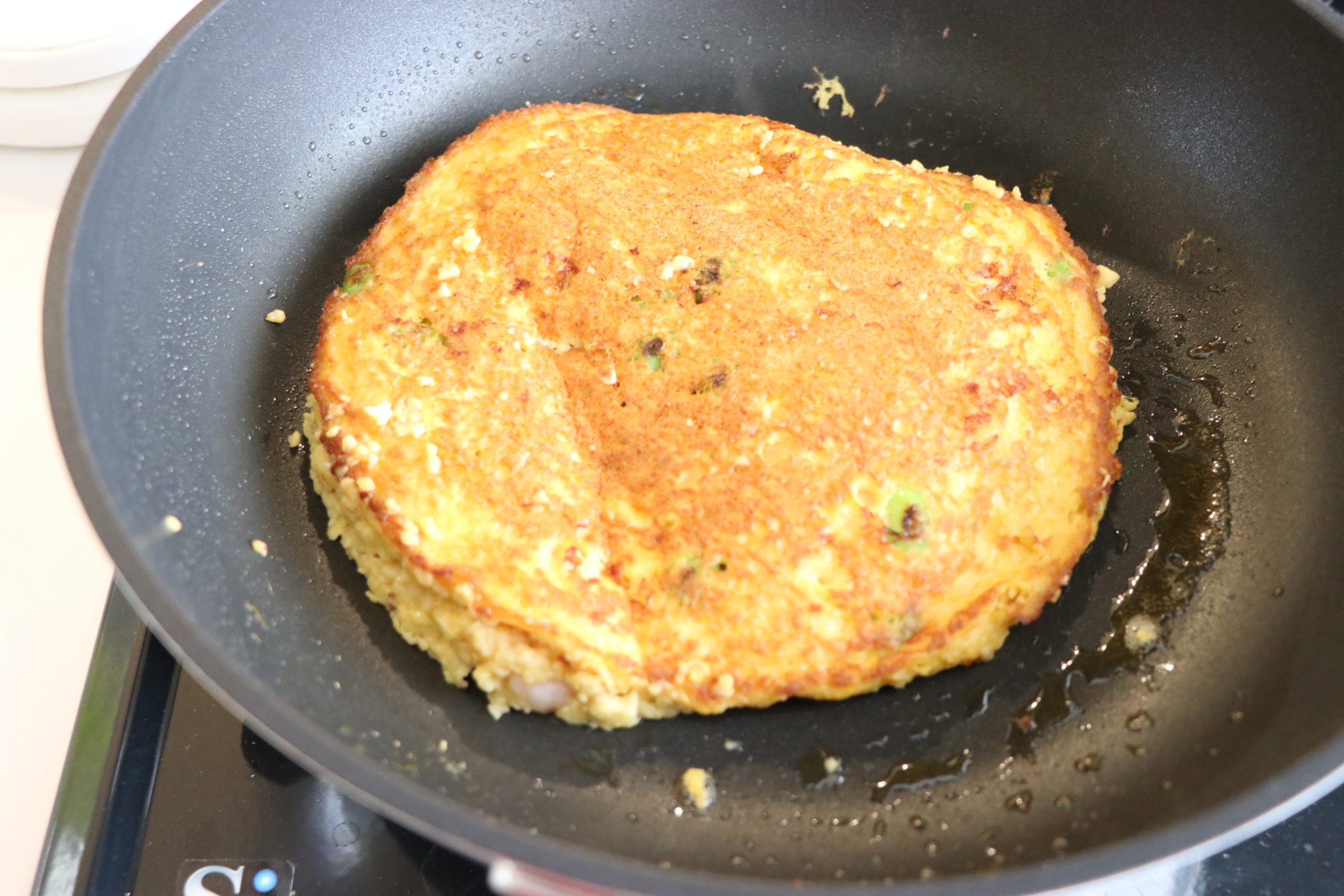 蓋をして、２分程焼き、蓋をはずして、こんがり焼き目がつくまで焼く。